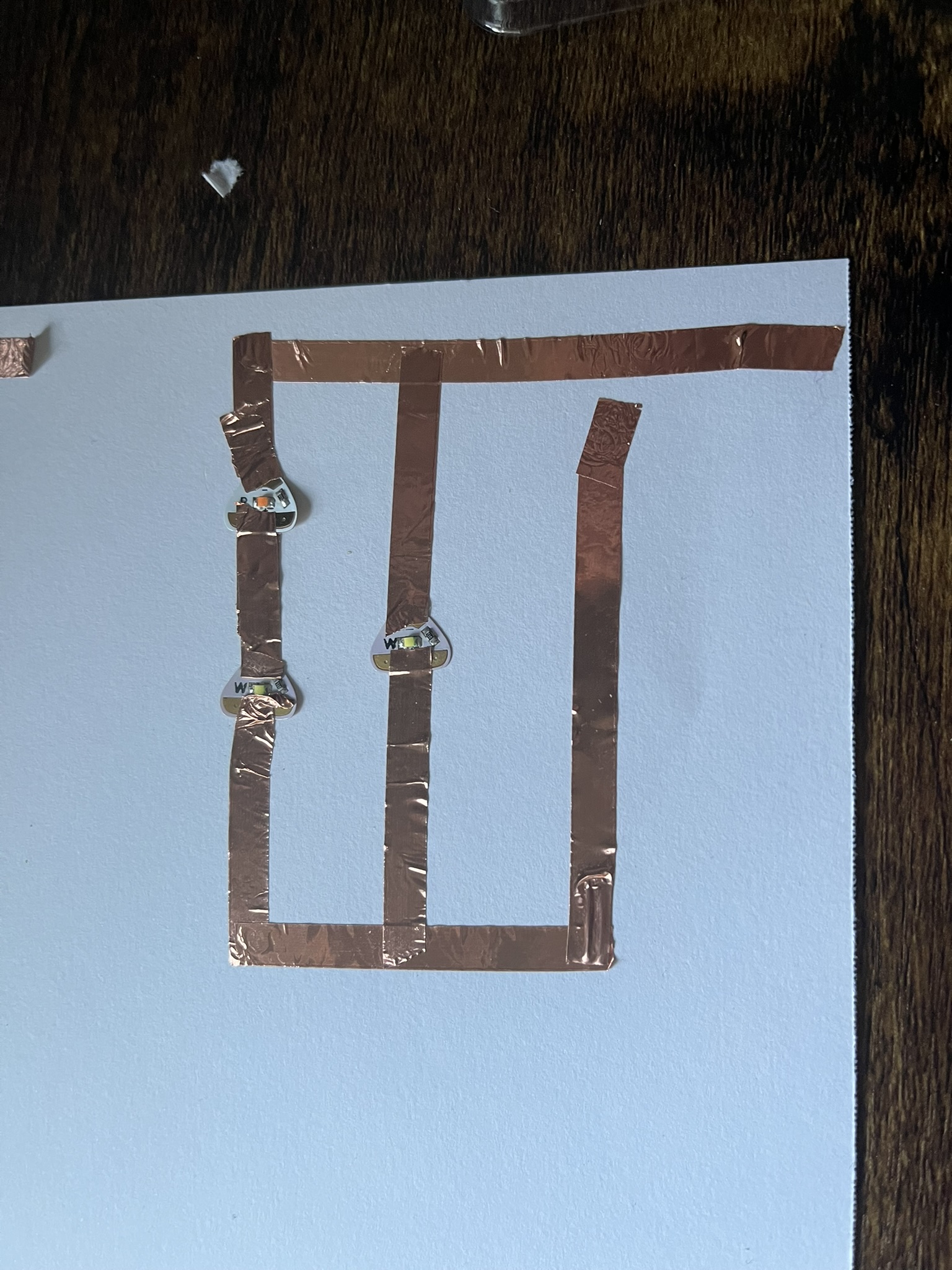 In order to make very basic circuits I spent a lot of time experimenting with series, parallel, and simple circuits using copper tape.